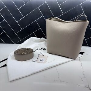 Cuyana Linea Bucket Bag in Stone currently being sold for $498